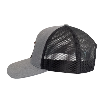 Leather patch deer trucker cap
